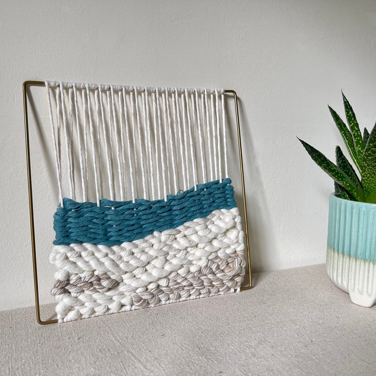 Turquoise and cream coastal design weaving