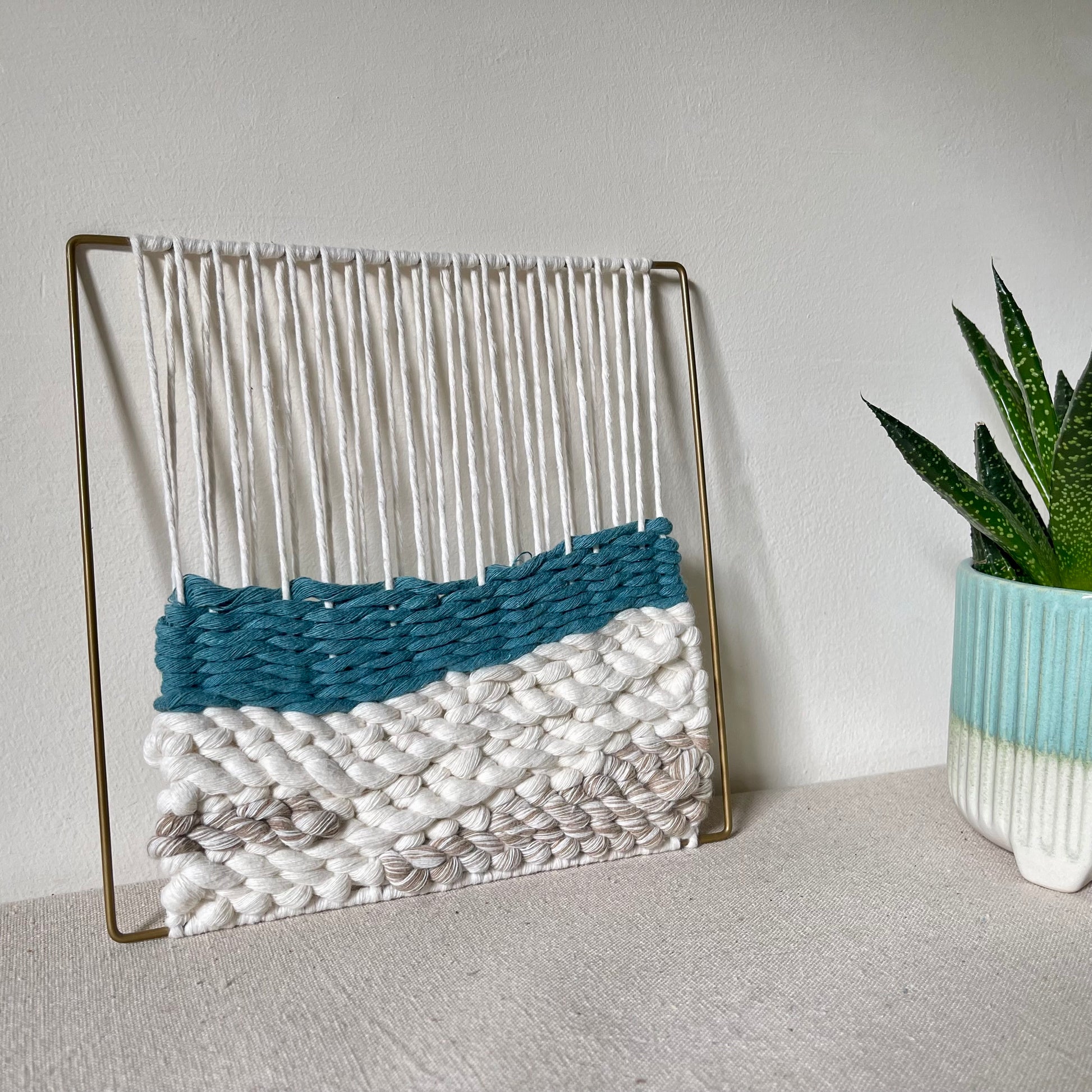 Turquoise and cream coastal design weaving