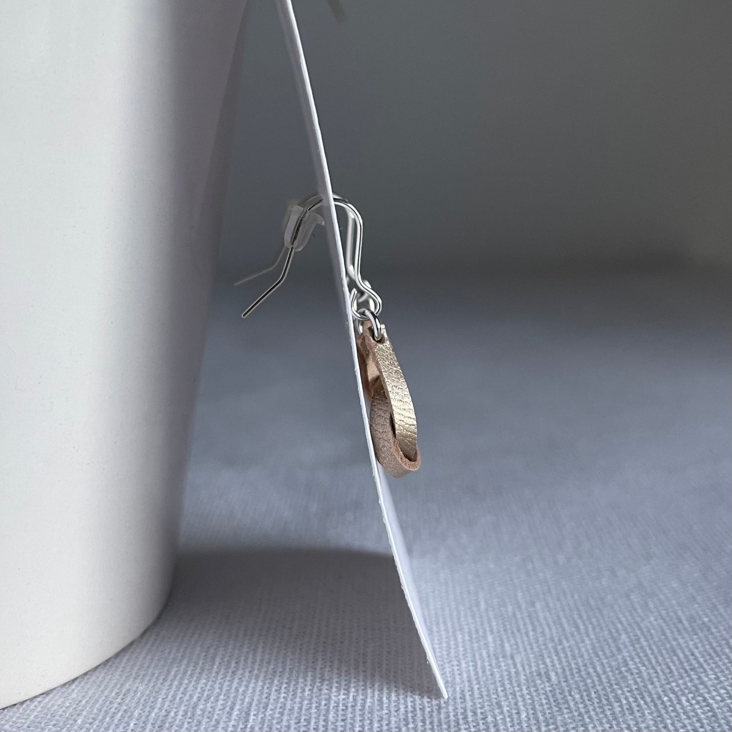 Pearlescent Gold Knotted Leather Drop Earrings