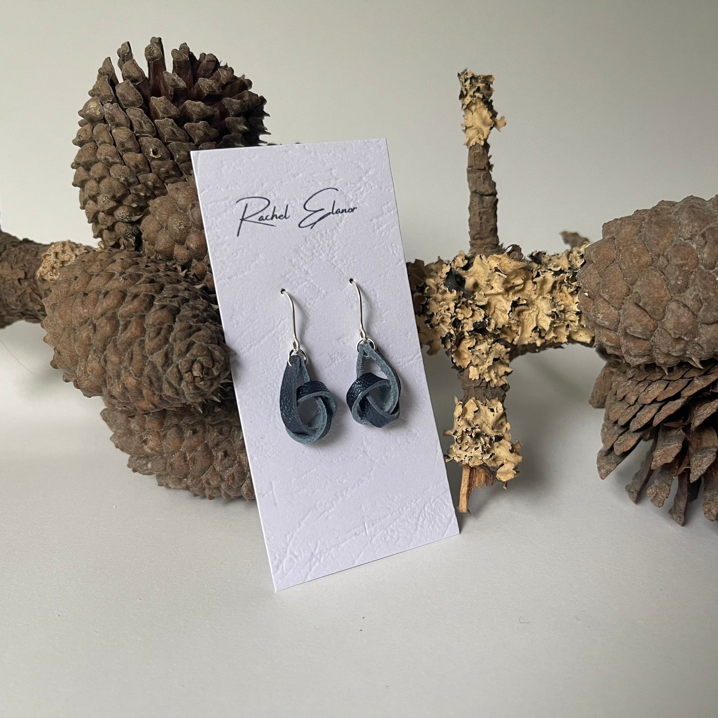 Pearlescent Blue Knotted Leather Drop Earrings