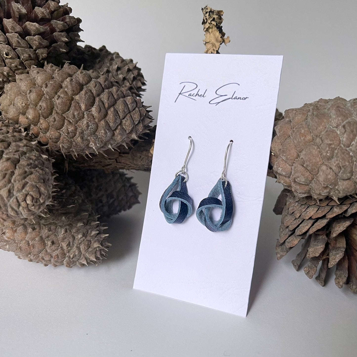 Pearlescent Blue Knotted Leather Drop Earrings