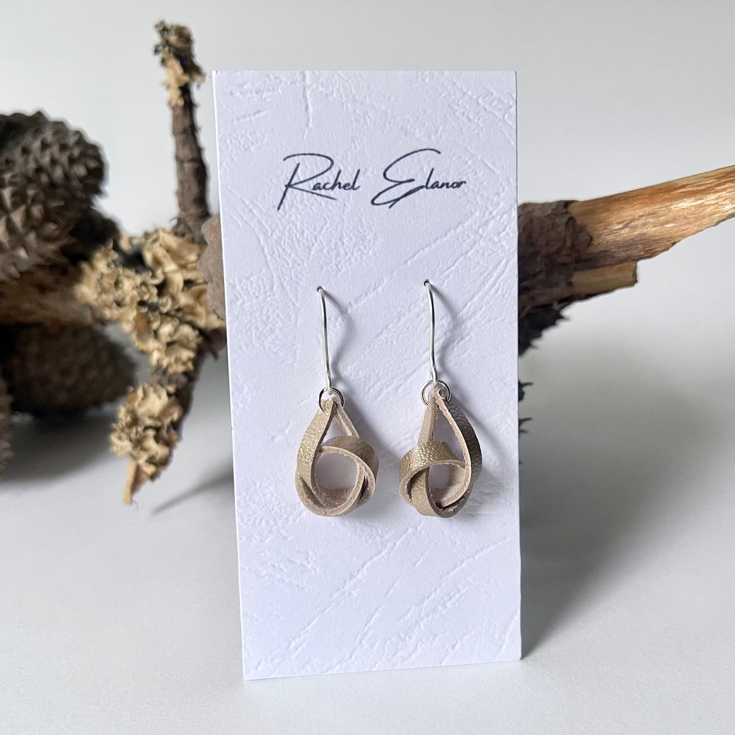 Pearlescent Gold Knotted Leather Drop Earrings