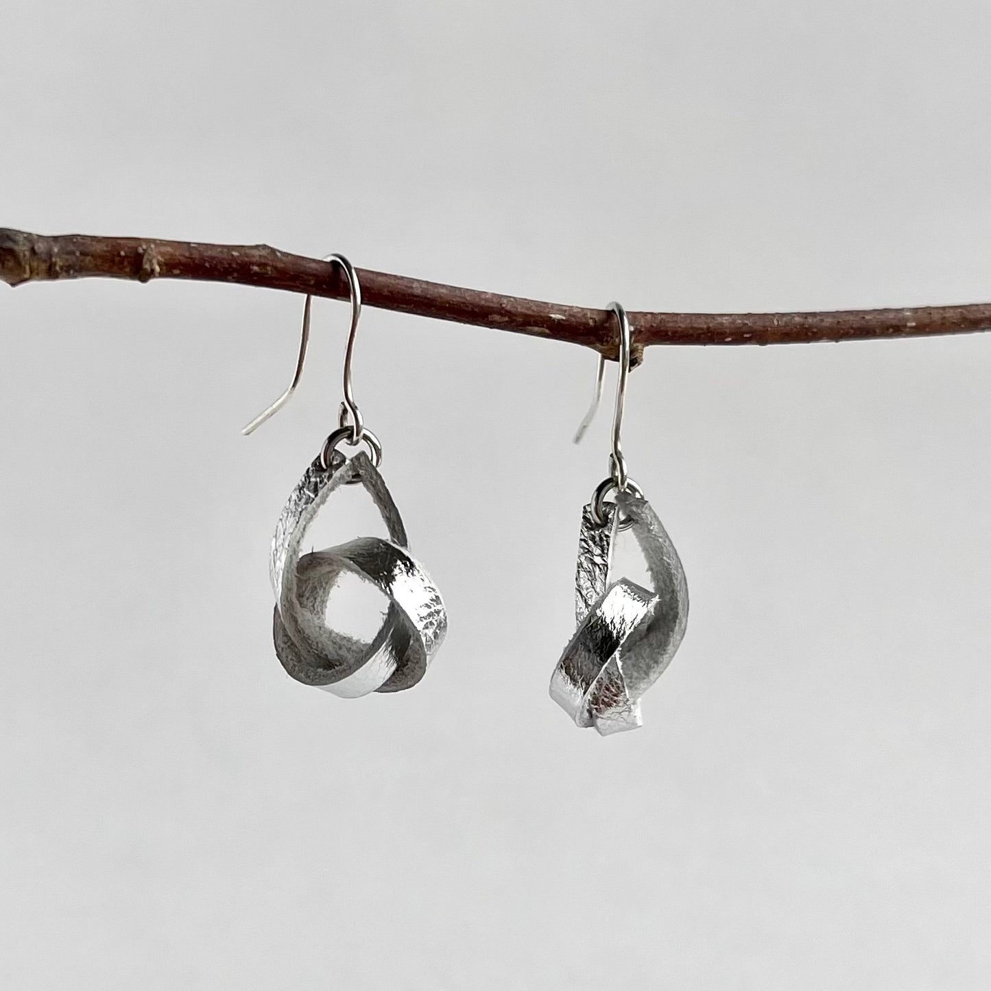 Silver Metallic Knotted Leather Earrings